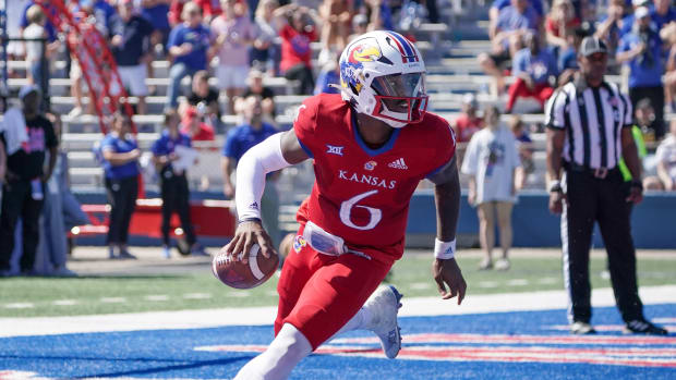 Sep 24, 2022; Lawrence, Kansas, USA; Kansas Jayhawks quarterback Jalon Daniels (6) drops back to pass against the Duke Blue Devils during the second half of the game at David Booth Kansas Memorial Stadium. Mandatory Credit: Denny Medley-USA TODAY Sports